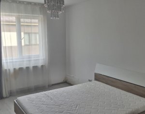 Apartament cu doua dormitoare, parcare proprie, mobilat si utliat